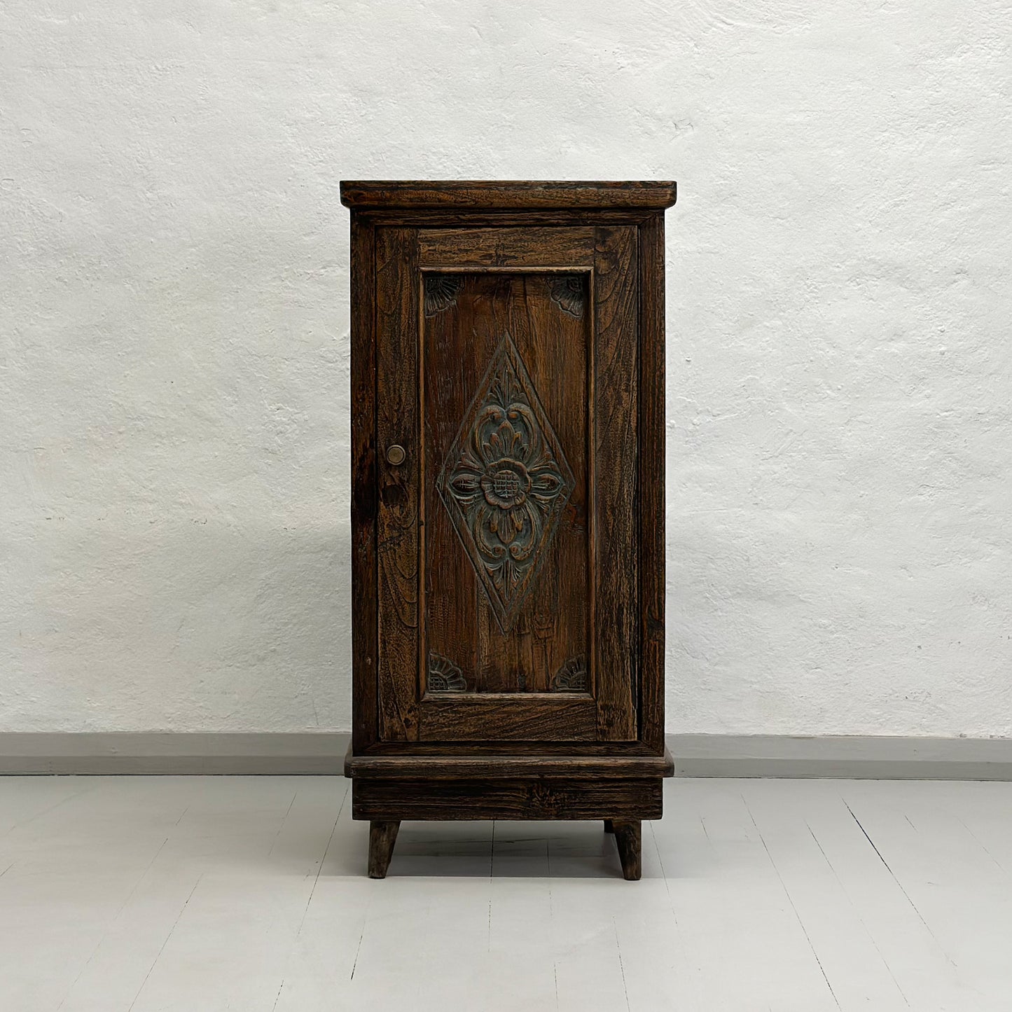 Narrow Carved Javanese Cabinet