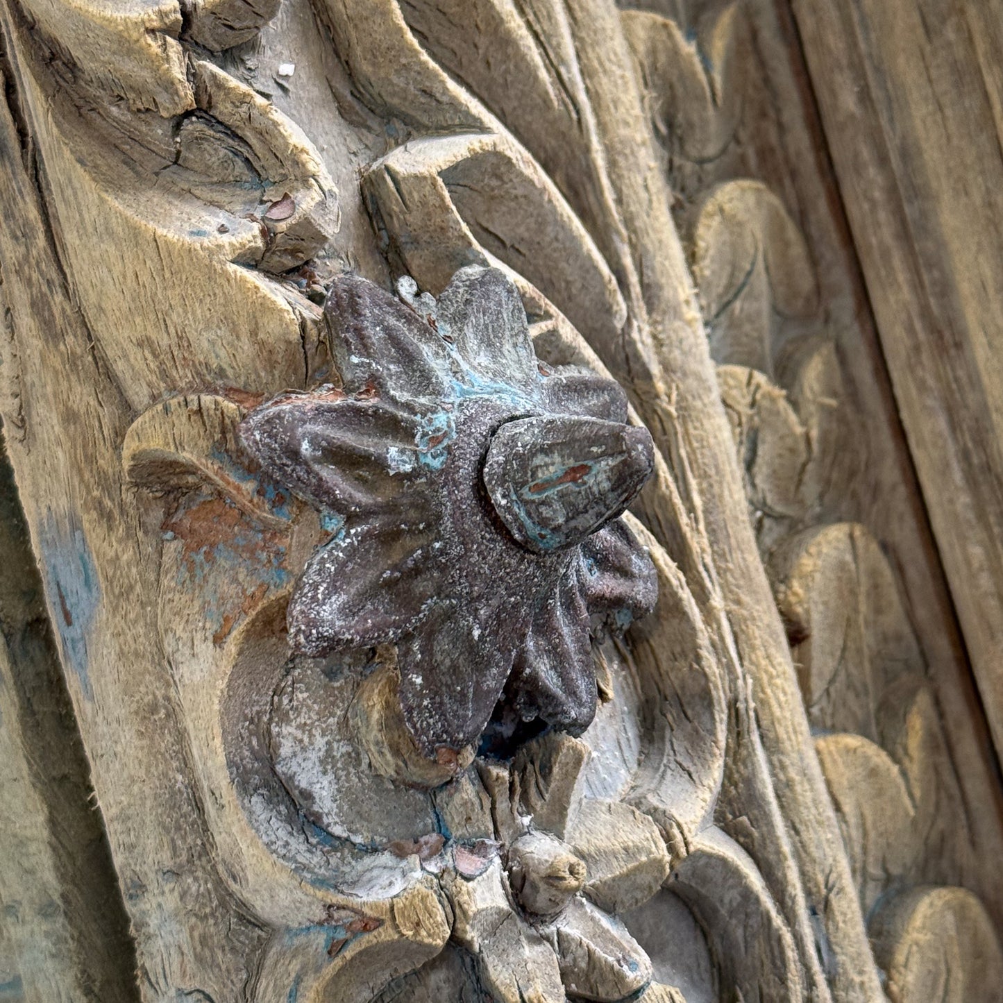Close-up of ornate wooden carvings with intricate details