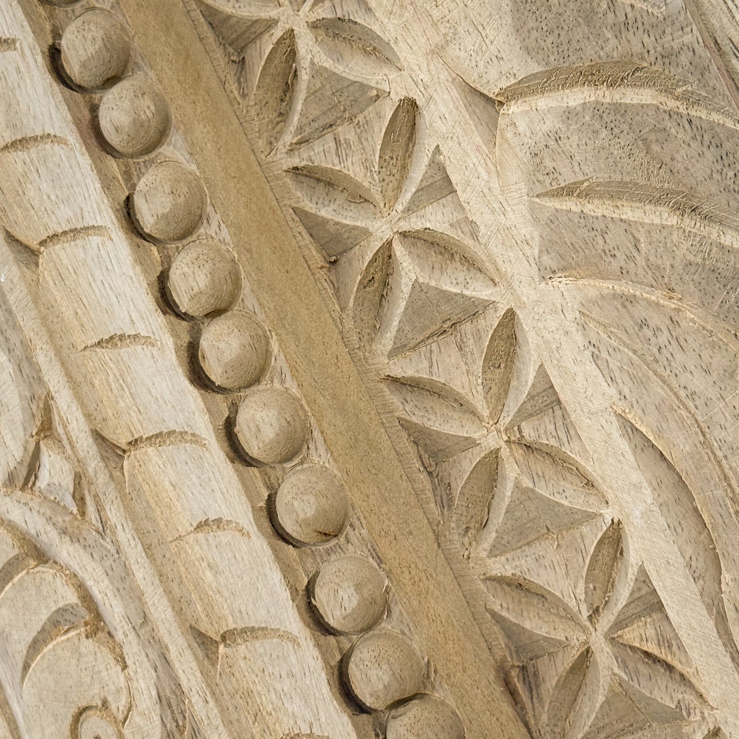 Close-up of detailed stone carvings with geometric patterns