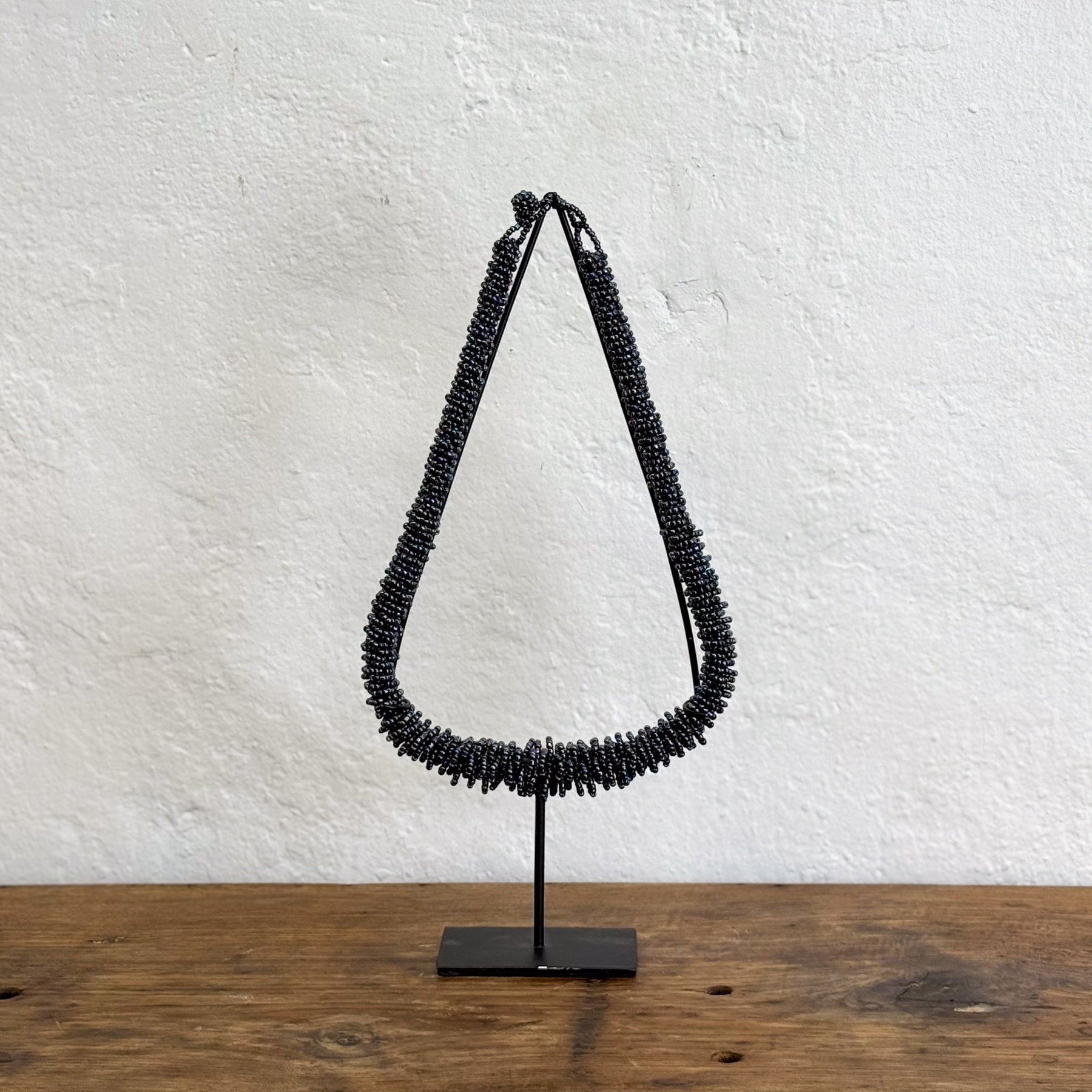 Beaded Dark Blue Necklace on Stand