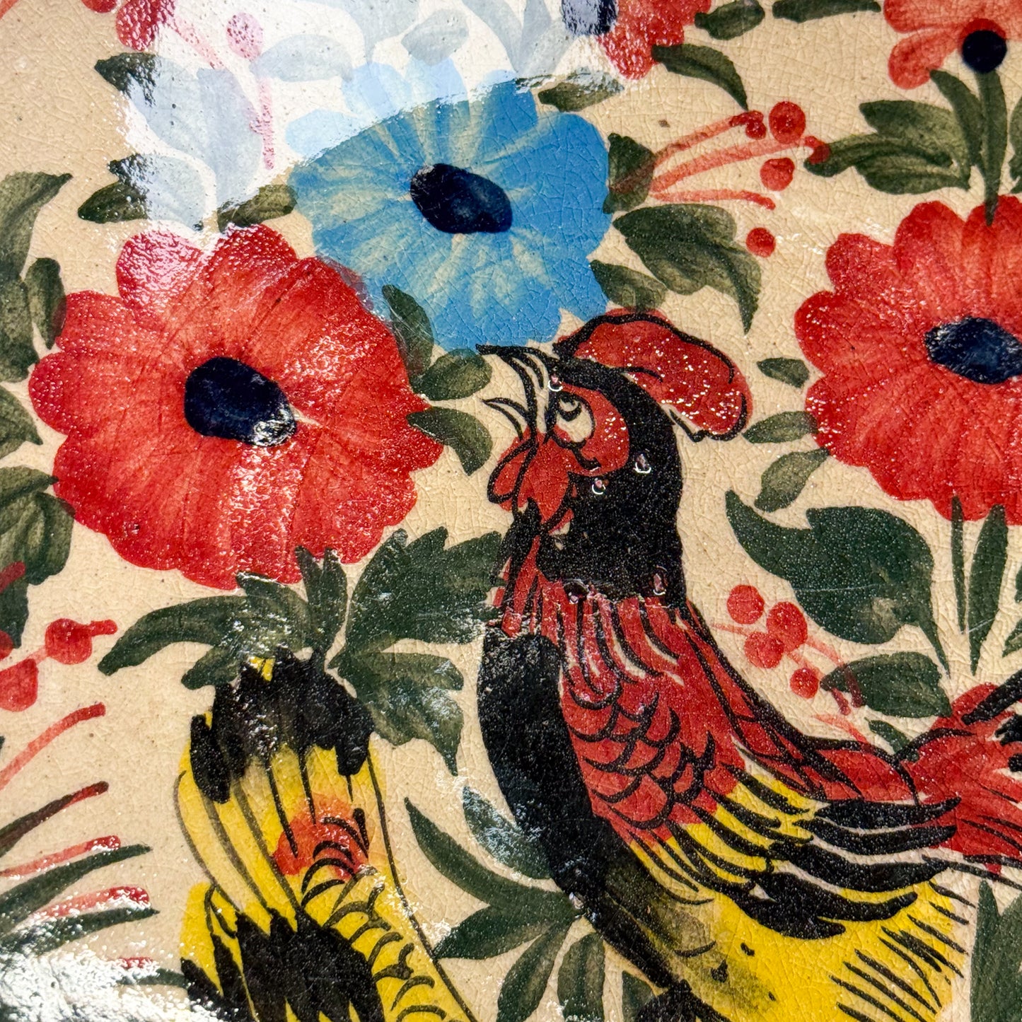 Decorative fabric with rooster, parrot, and floral pattern