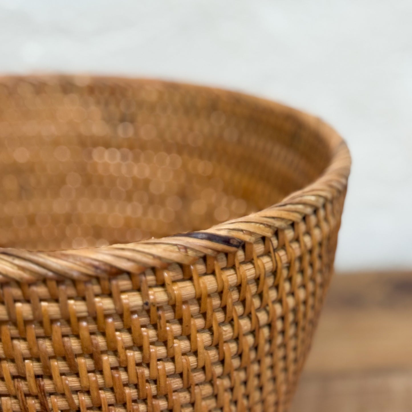 Close-up of a woven basket with a blurred background