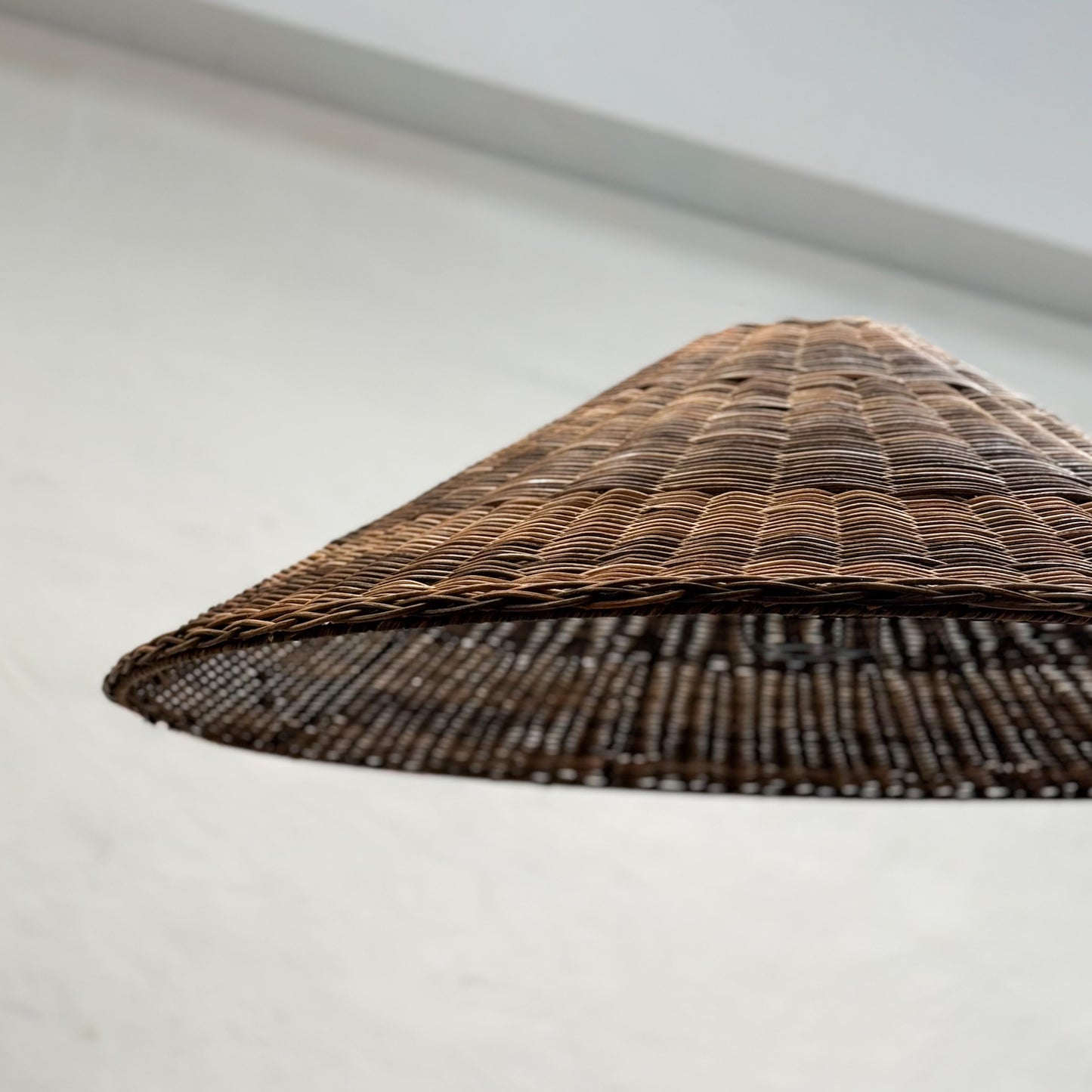 Woven lampshade on a white background