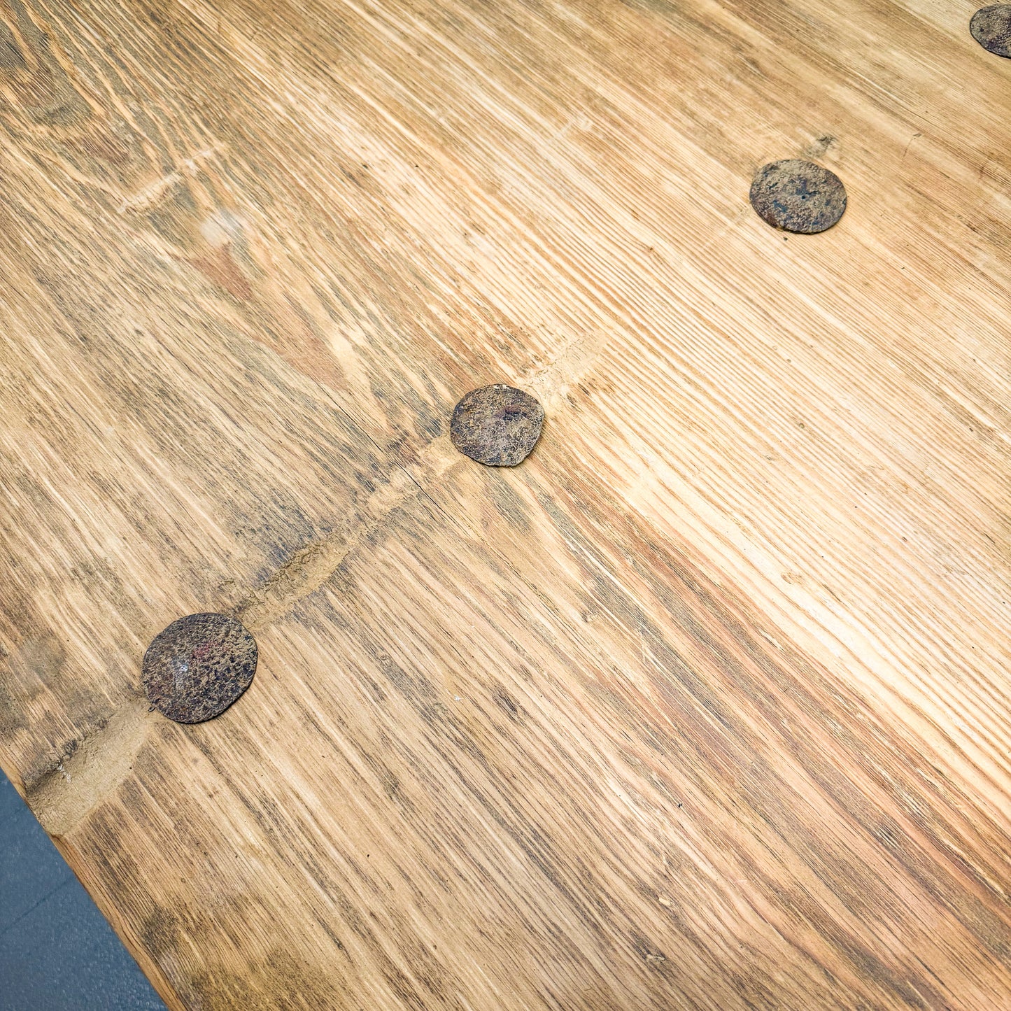 Close-up of a wooden floor with a parquet pattern