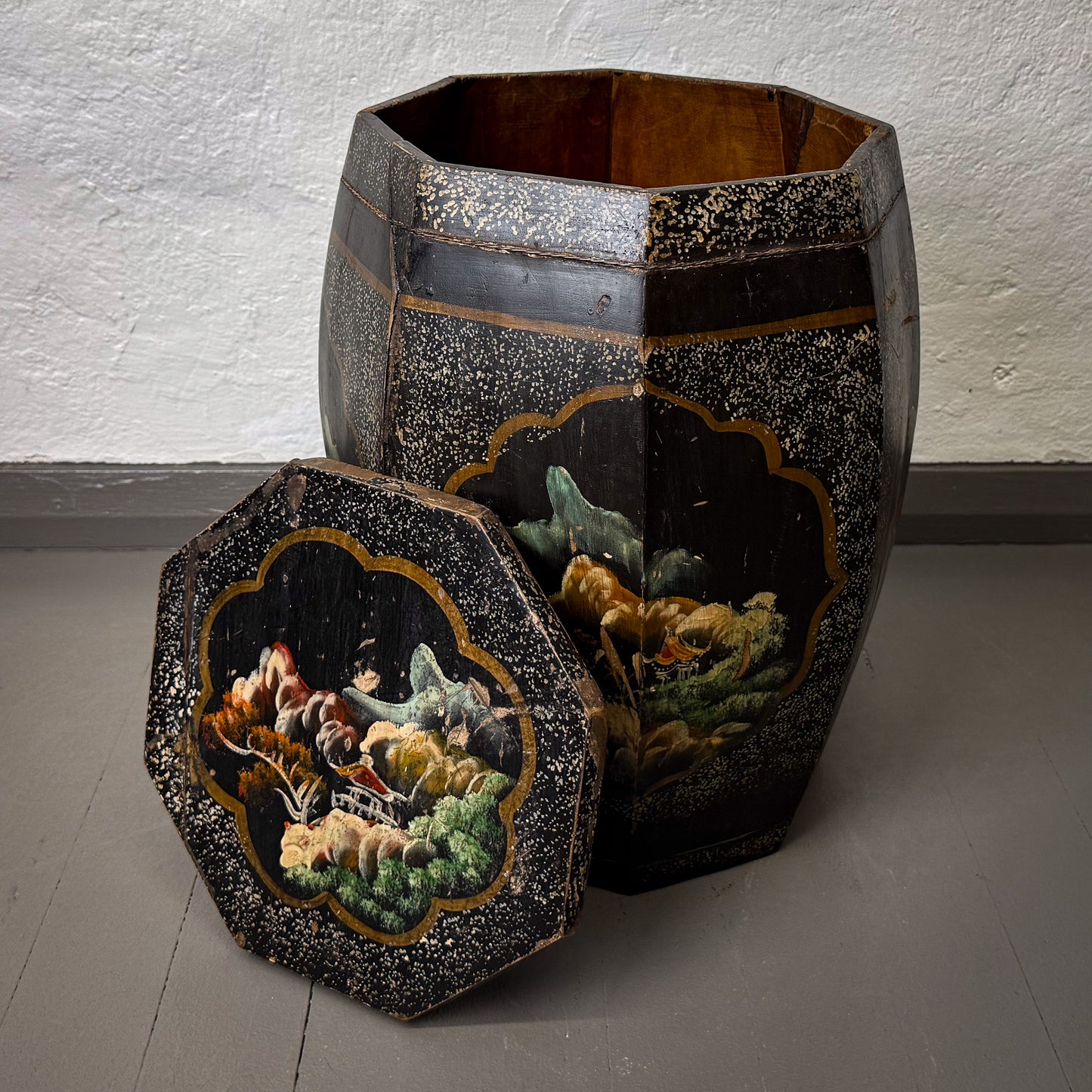 Decorative vase with intricate designs on a plain background