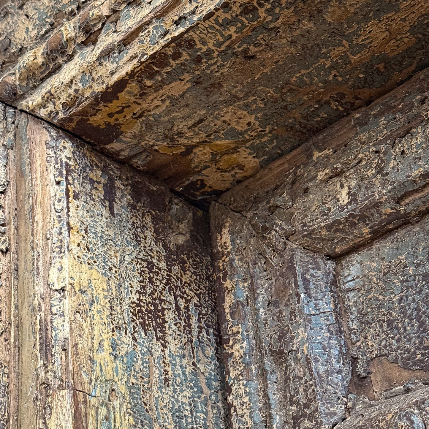 Close-up of textured stone wall with natural patterns