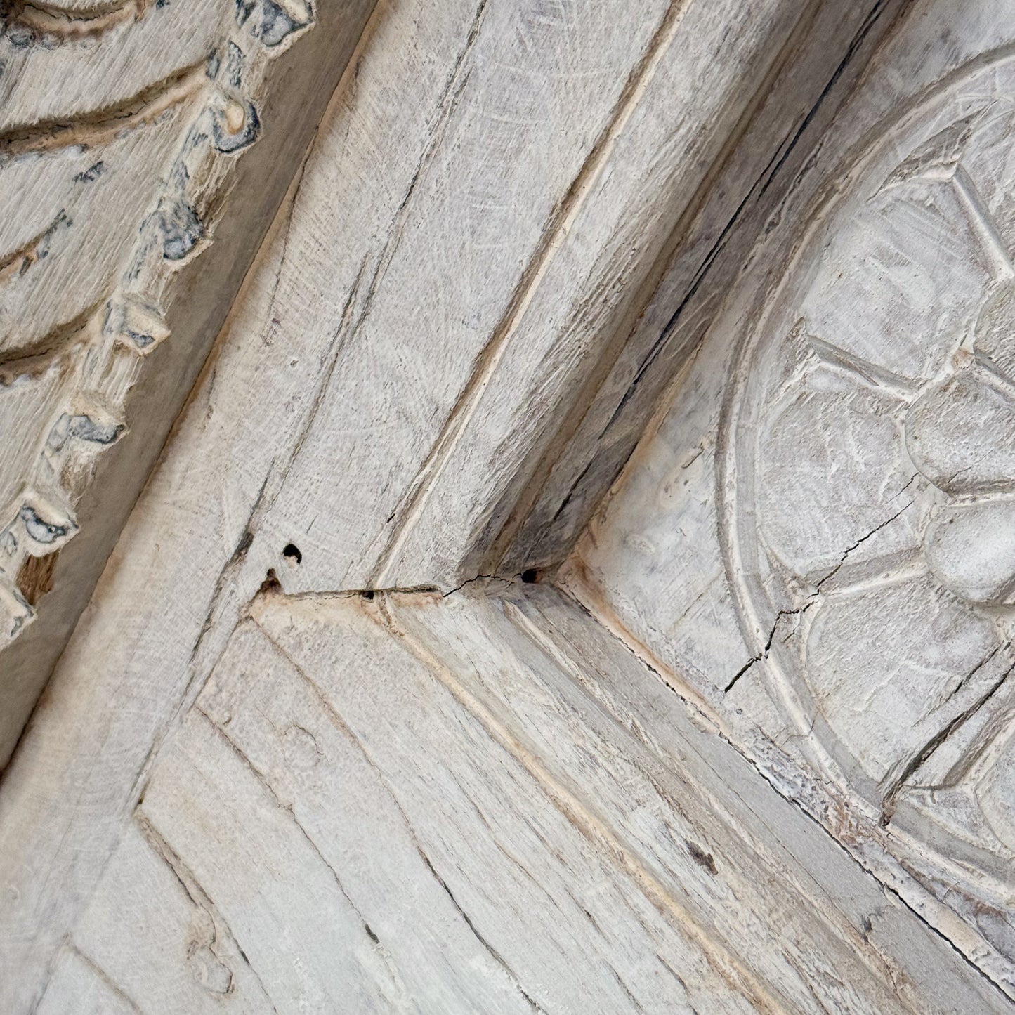 Close-up of stone architectural detail with geometric patterns