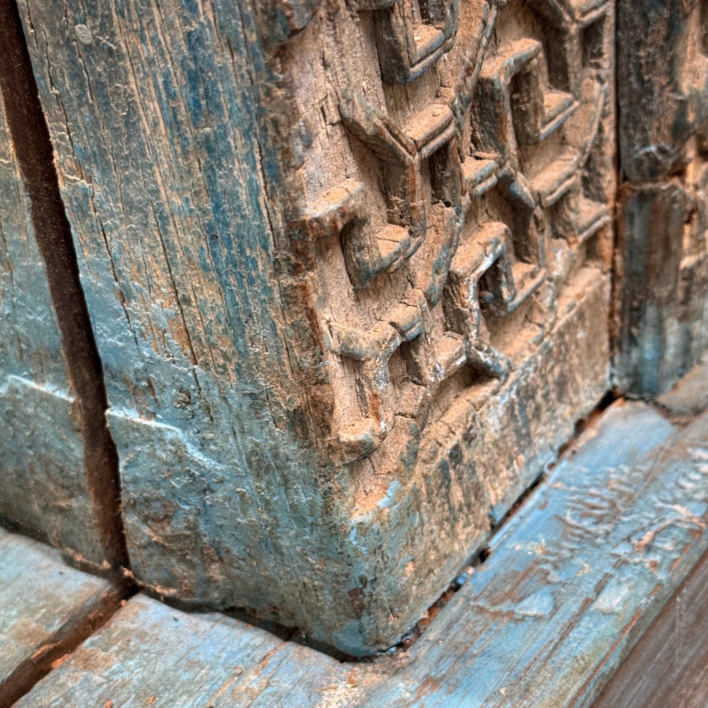 Close-up of a textured stone surface with intricate patterns