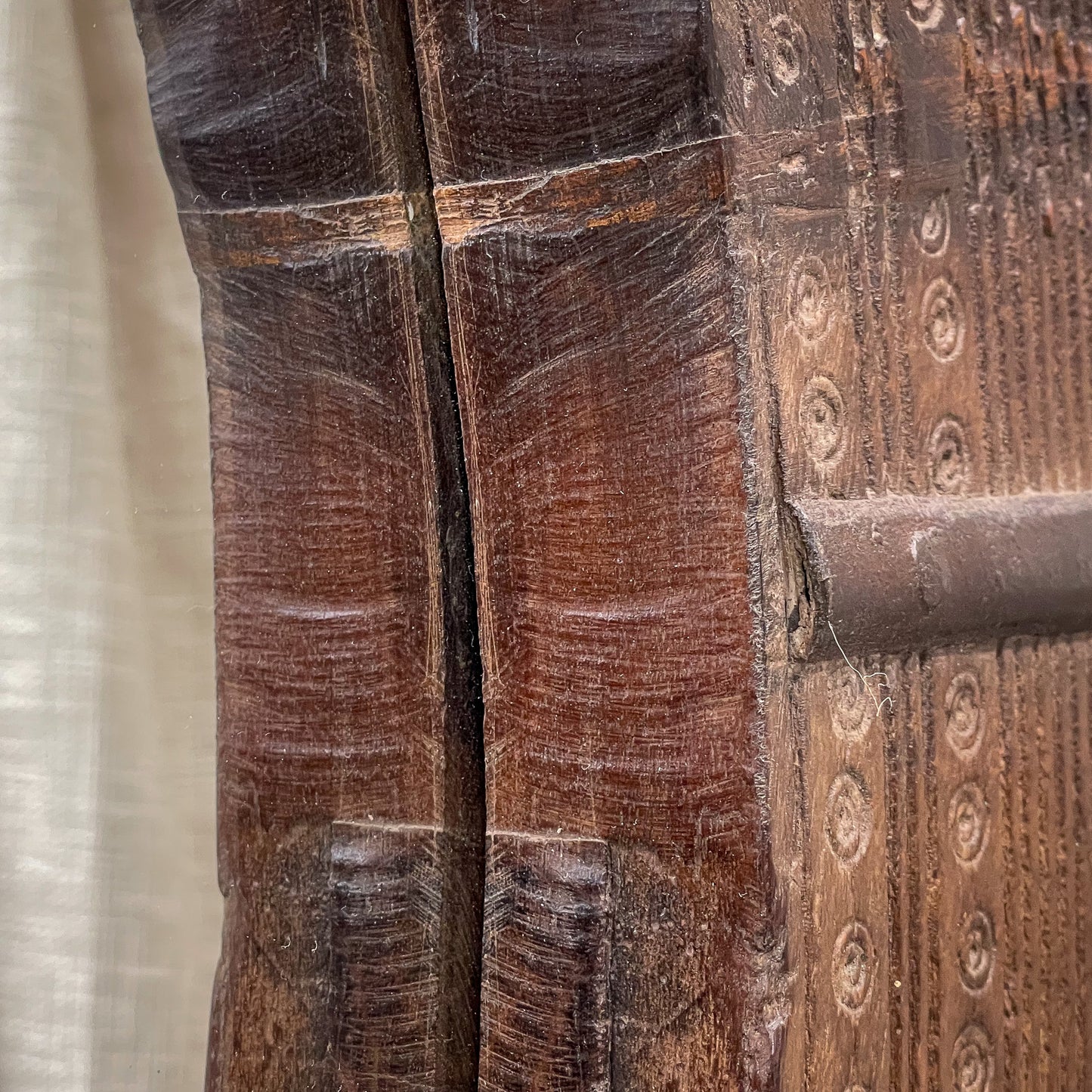 Close-up of a textured wooden surface with intricate patterns