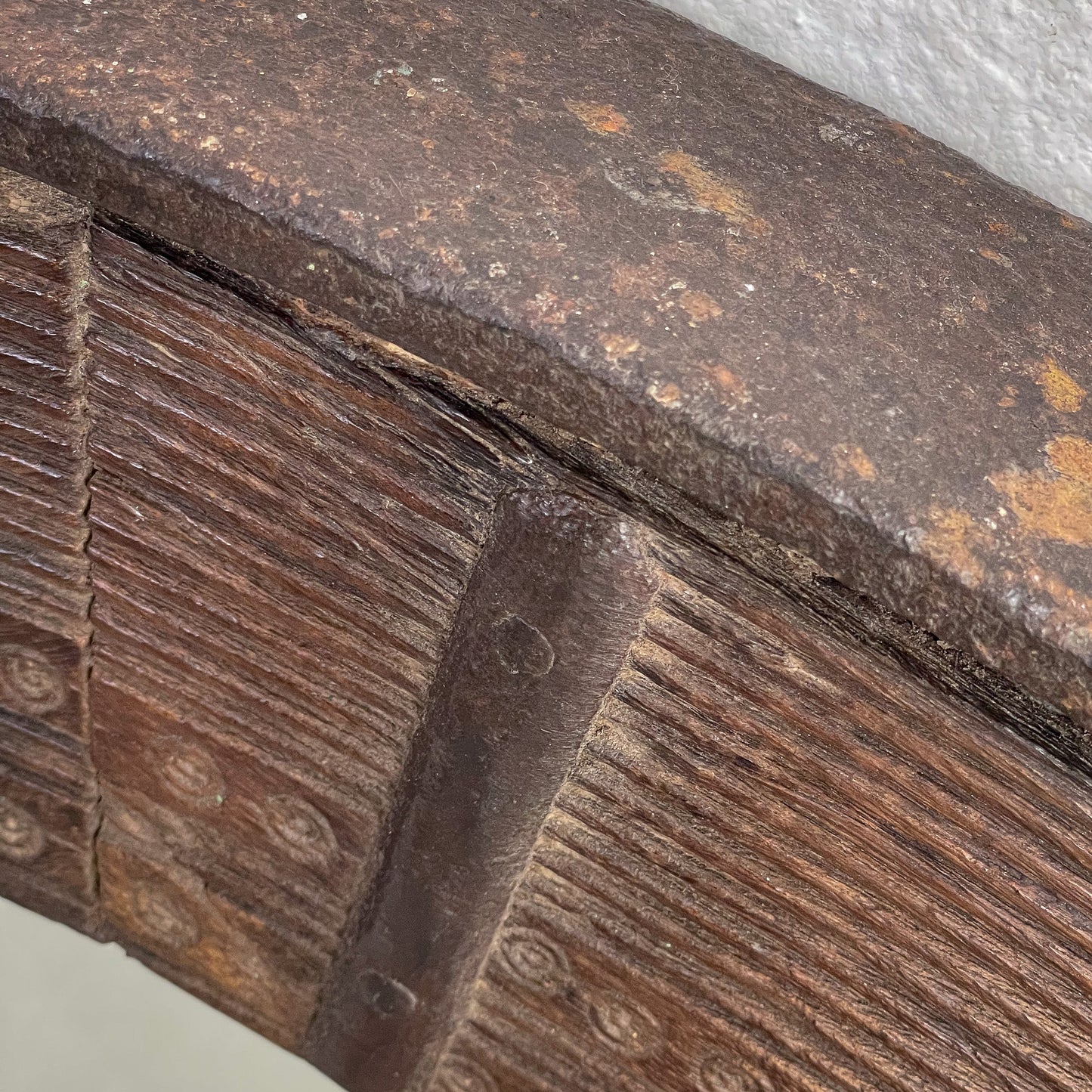 Close-up of a rusted metal object with textured surface