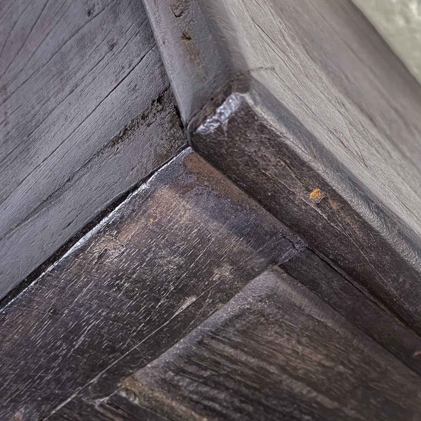 Close-up of wooden flooring with a focus on the grain and texture.