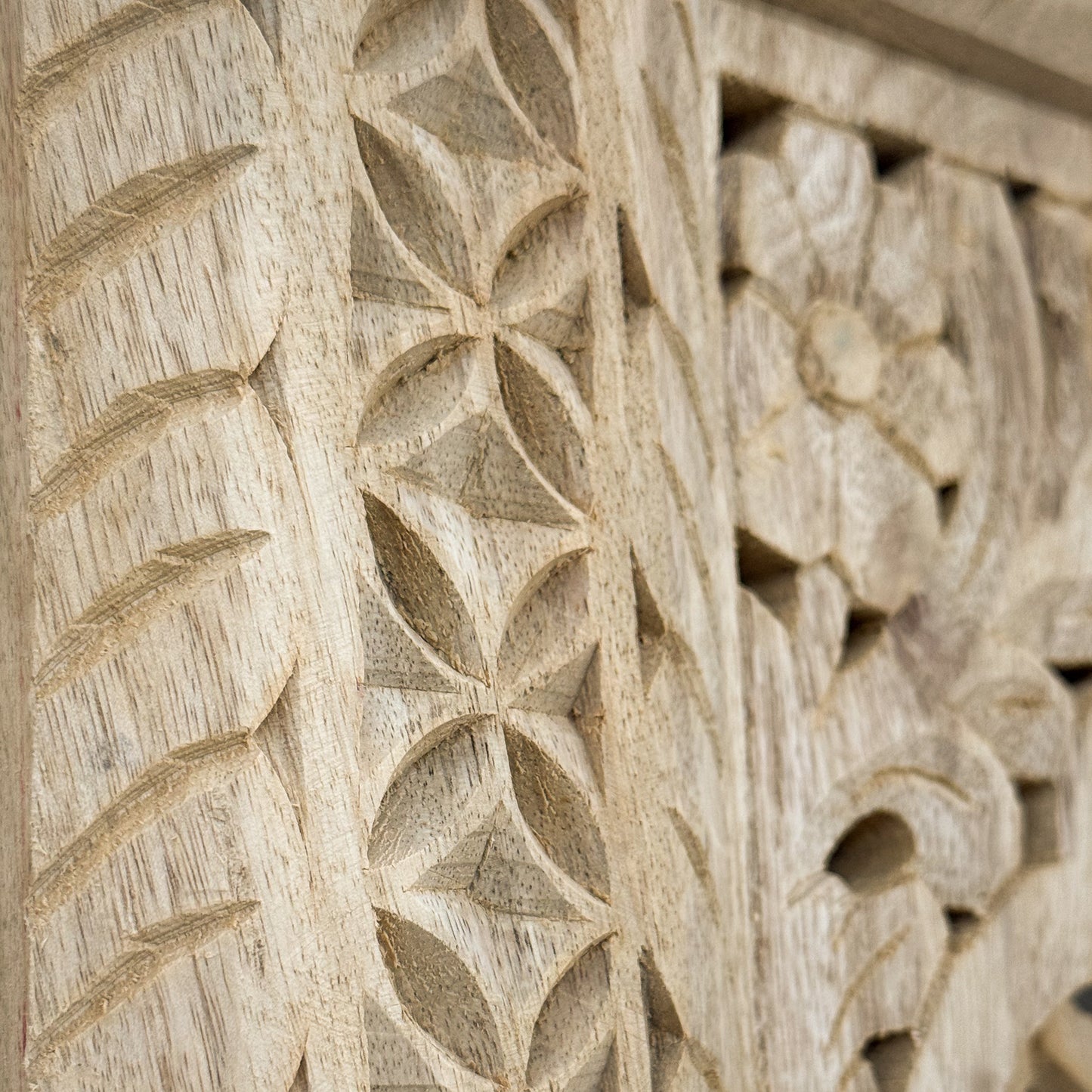 Close-up of a wooden carvings with intricate patterns