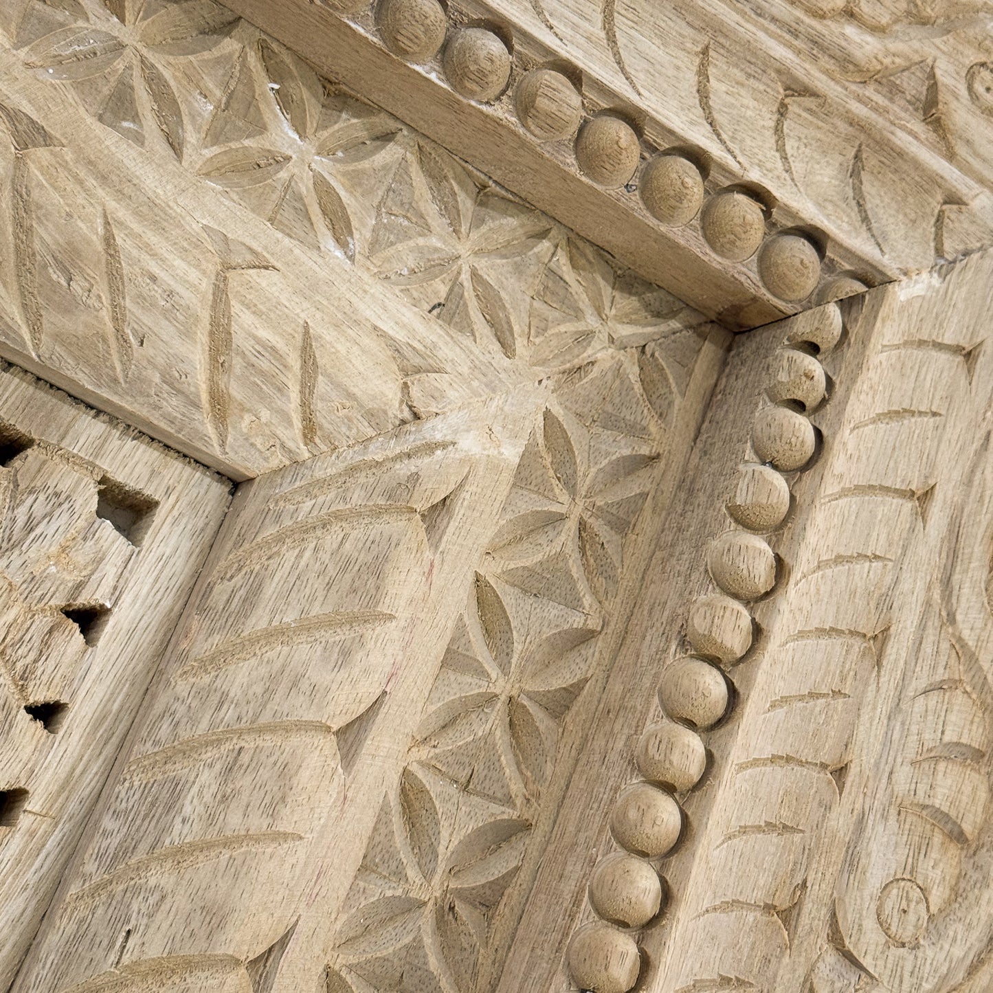 Close-up of detailed stone architecture with geometric patterns