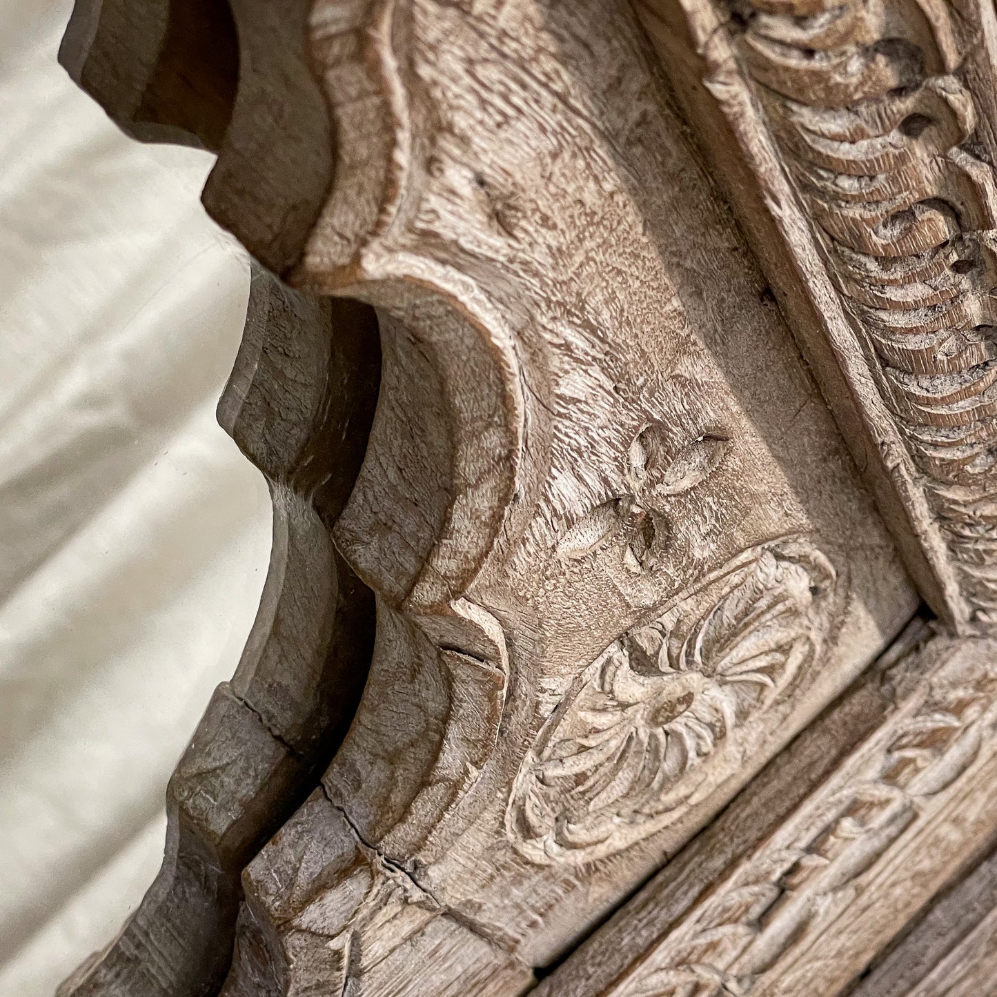 Close-up of detailed stone carvings on a architectural structure