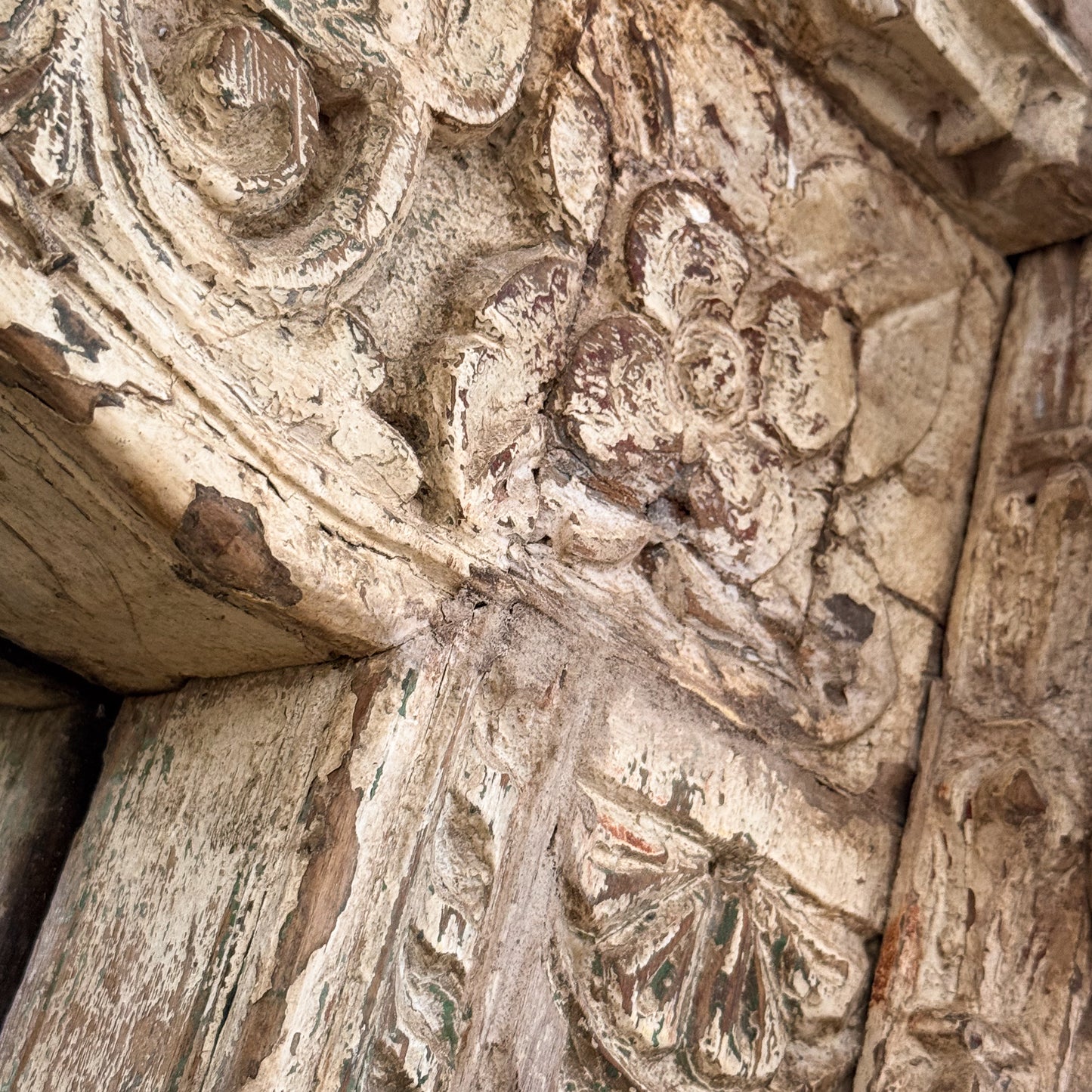 Close-up of intricate stone carvings on a historical building.