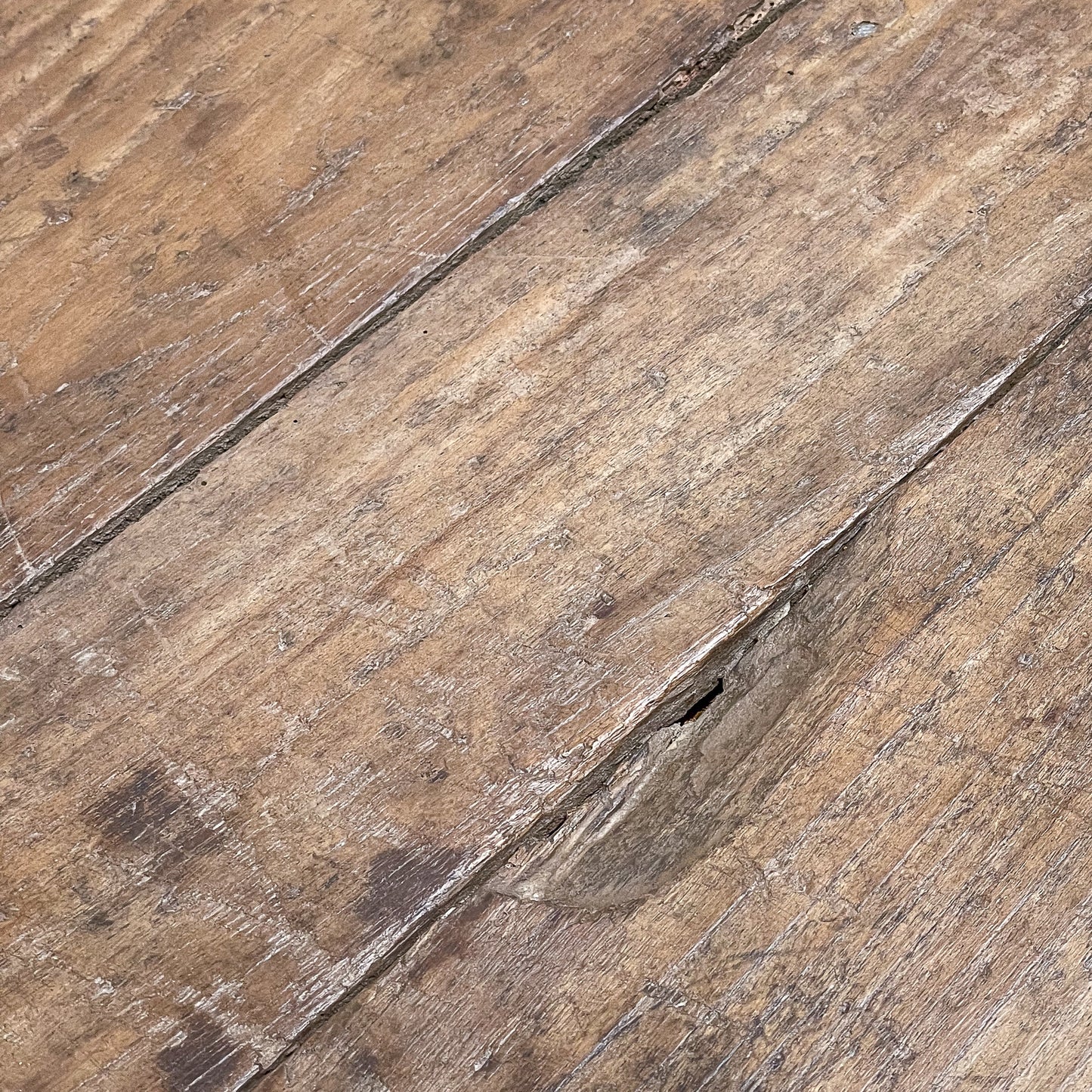 Close-up of wooden flooring with visible grain and texture