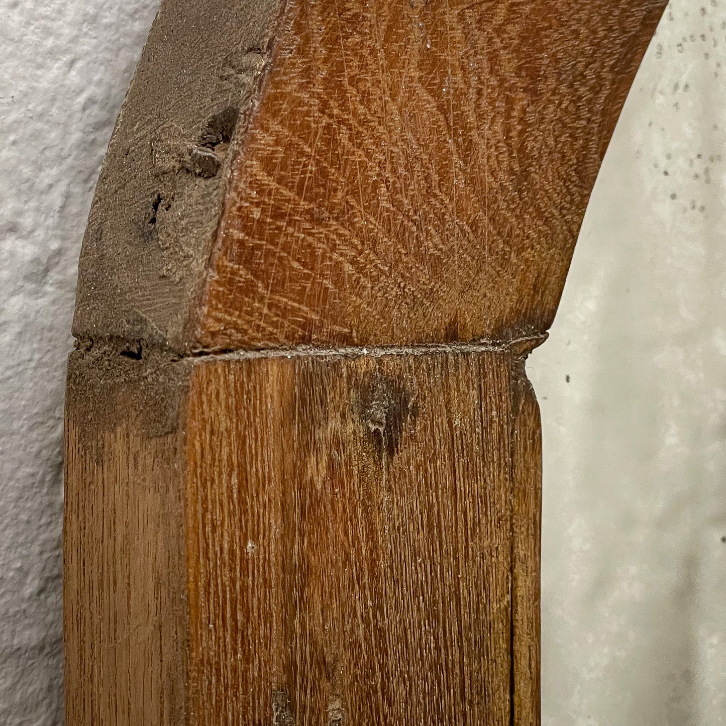 Close-up of a wooden surface with a textured background