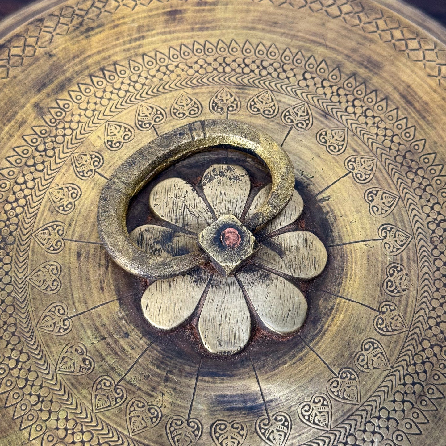 Close-up of a decorative metal object with intricate patterns