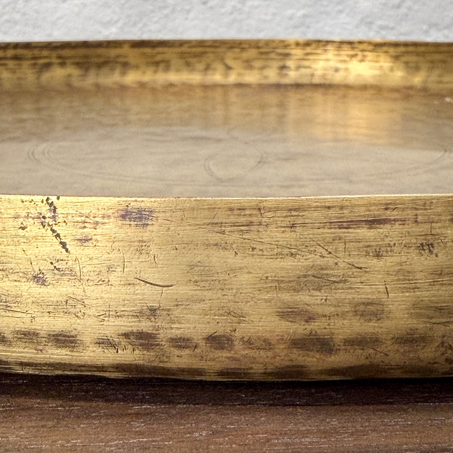 Close-up of a wooden surface with visible grain and texture