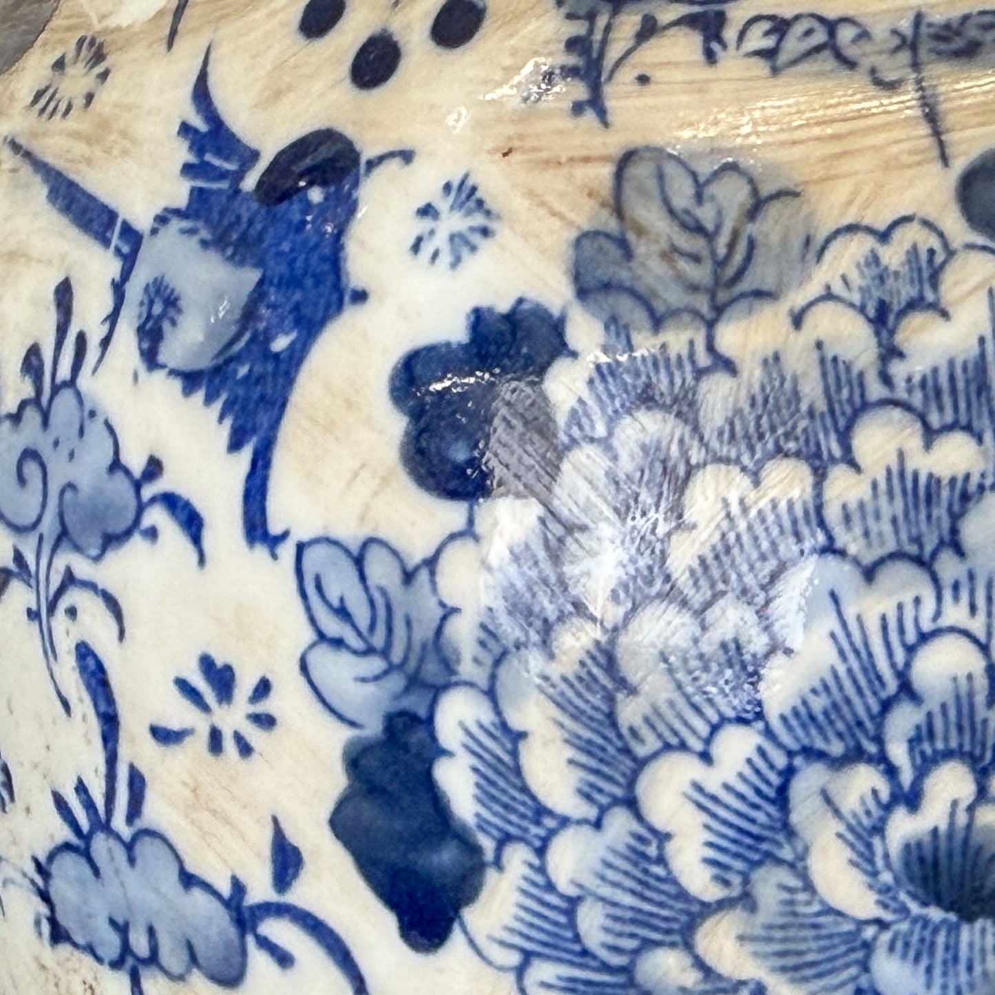 Close-up of blue and white floral patterned ceramic dish