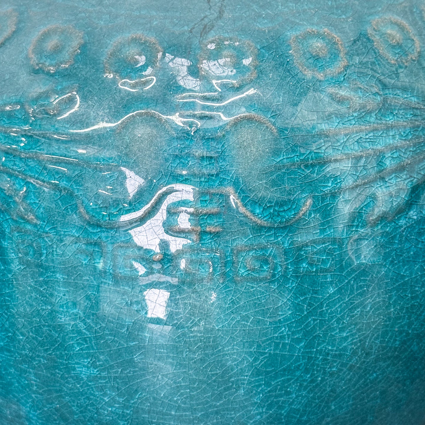 Close-up of a textured blue surface with patterns