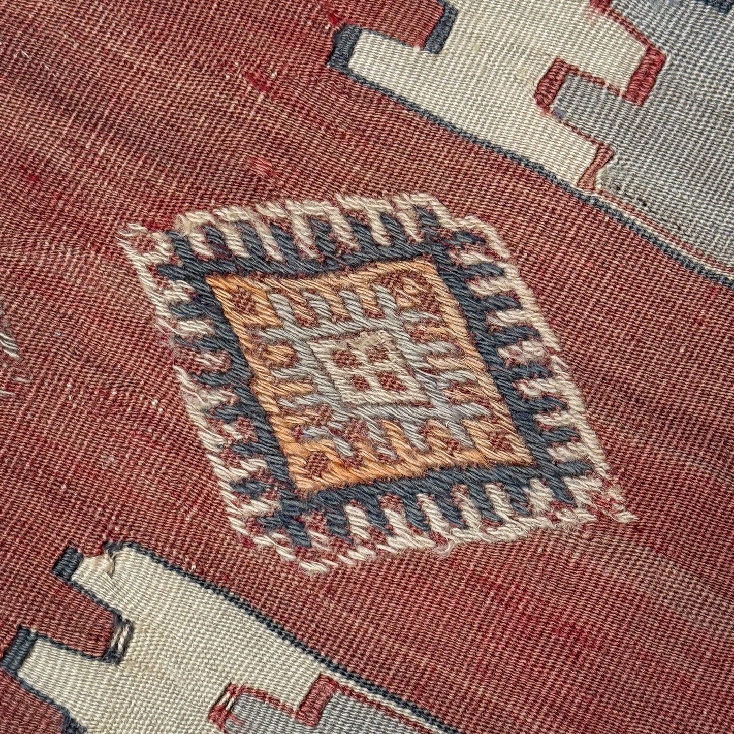 Close-up of a textured fabric with geometric pattern