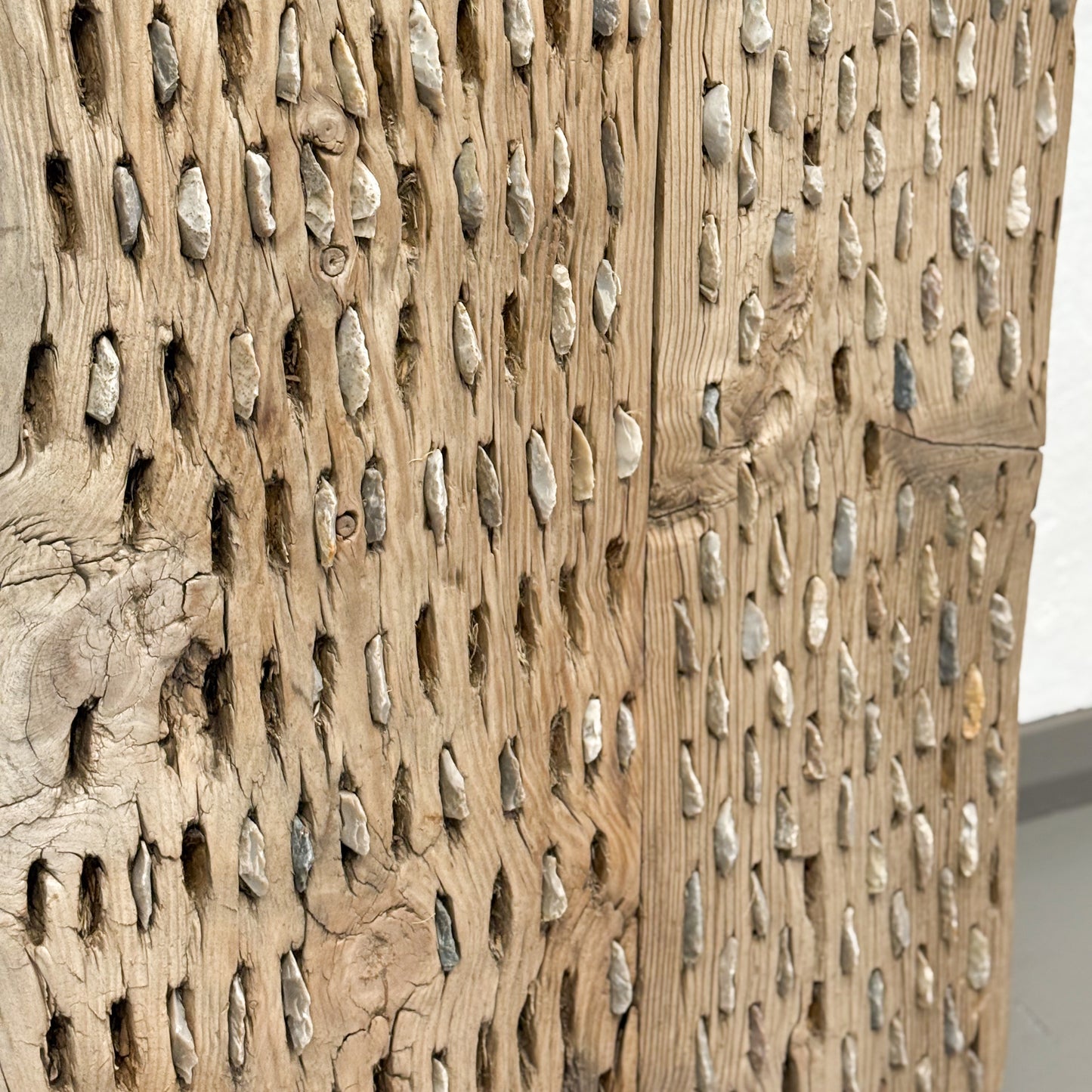 Close-up of a textured wooden surface with a natural pattern
